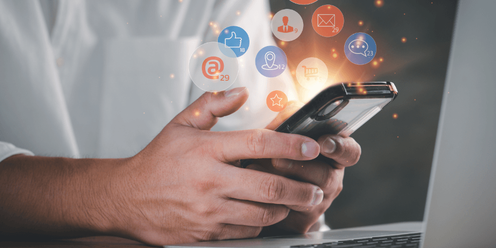 man on phone using social media apps